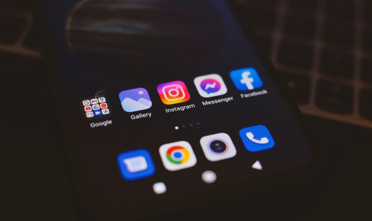 Close-up of an Android phone home screen filled with app icons