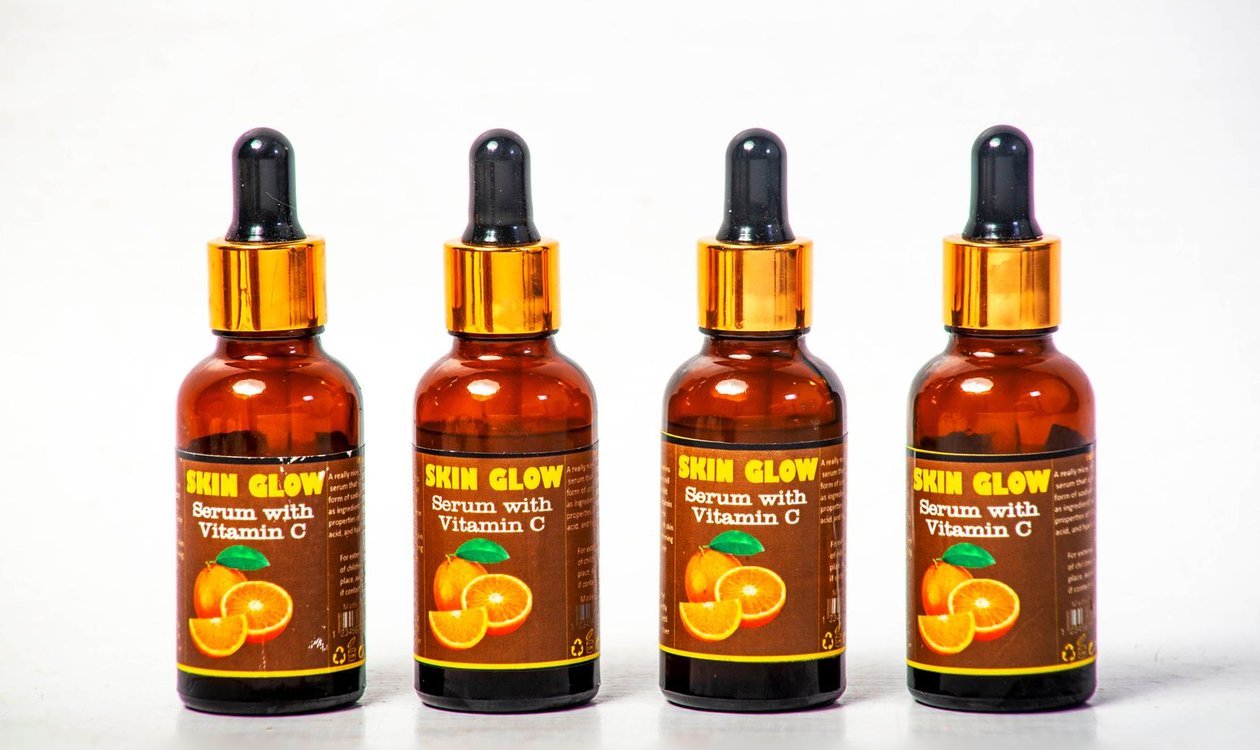 Row of vitamin C serum bottles showing different formulas and strengths